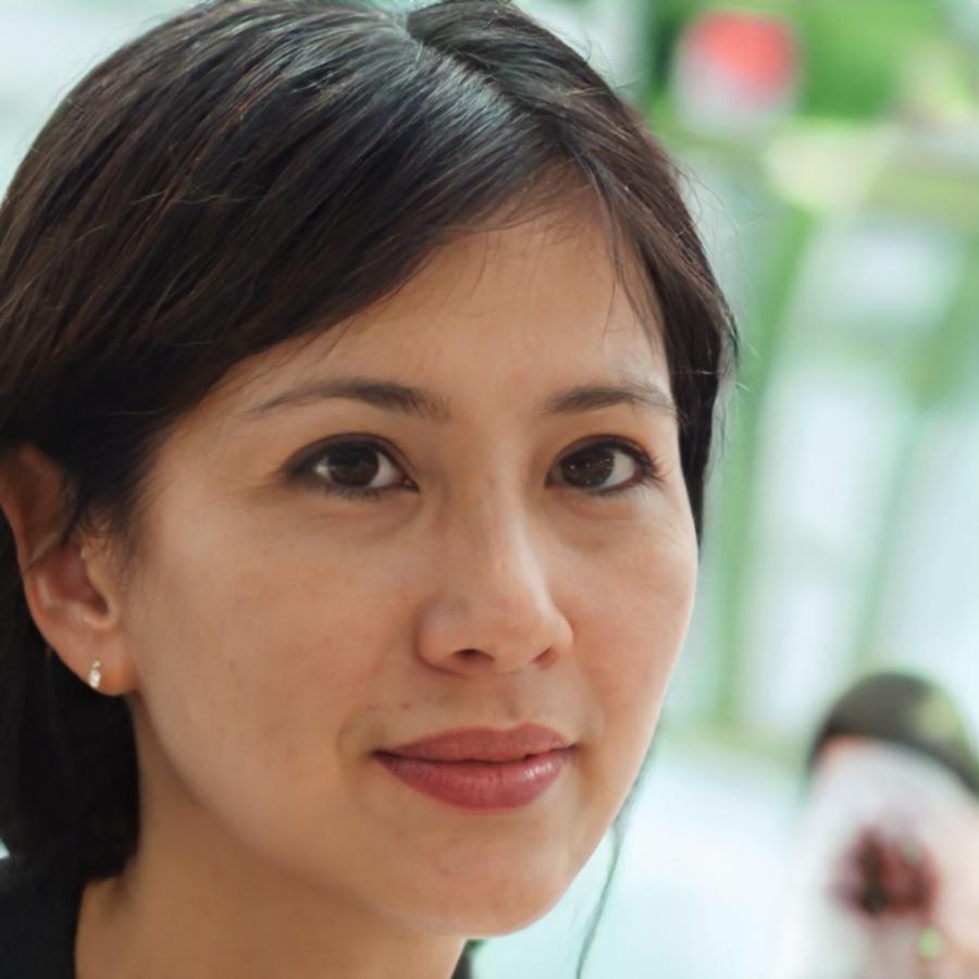 Experienced communication coach providing guidance during practice session